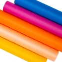 Nonwoven ribbons and fabrics